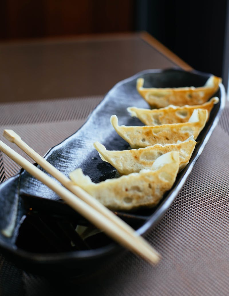 Japanese gyoza dumplings with dipping sauce
