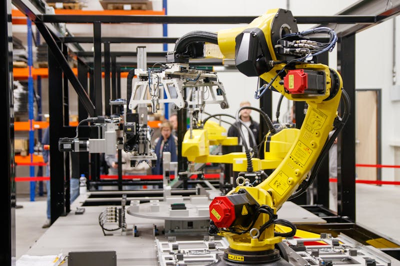 Industrial robot arm in manufacturing facility