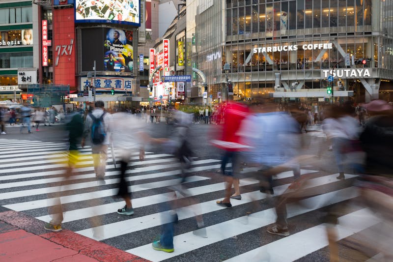 People crossing at Shibuya intersection Tokyo