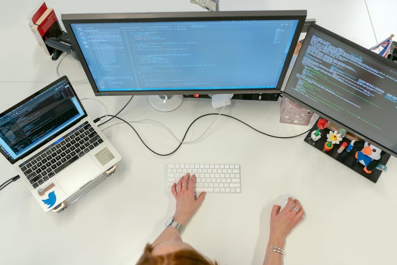 Software engineer coding on computer